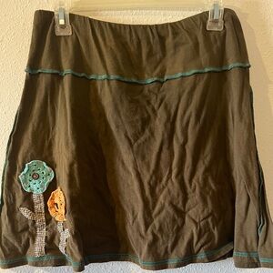 Stylish Brown Skirt with Floral Accents